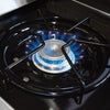 Get ready to ignite flavor with the Broil King Crown® S 440. A close-up of the blue open flame on the side burner brings your cooking game to life