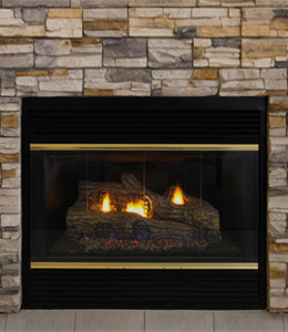 Cozy gas fireplace with flickering flames, stacked logs, and a stone mantle, protected by a glass screen