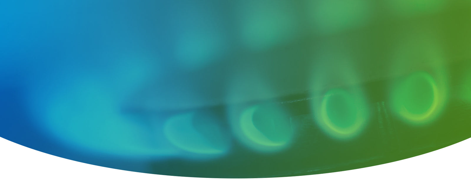 Vibrant blue natural gas flame dancing against a mesmerizing blue-green gradient backdrop