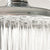 Hot water cascades from a sleek shower head, creating a relaxing and invigorating bathing experience
